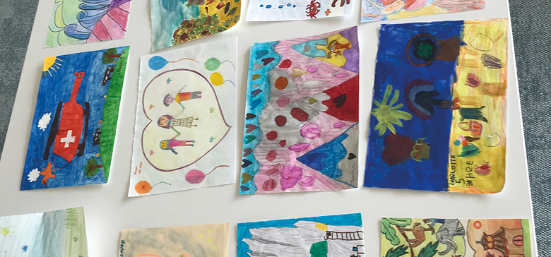 Kinderzeichnungen als Dankeschön für unsere Spende an soziale Projekte.